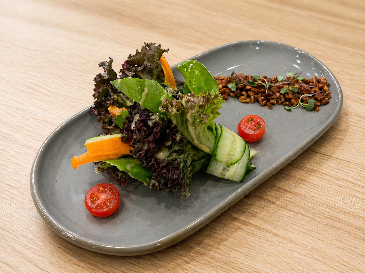 Luna Mesa Catering garden salad with cherry tomatoes, cucumber and candied nuts