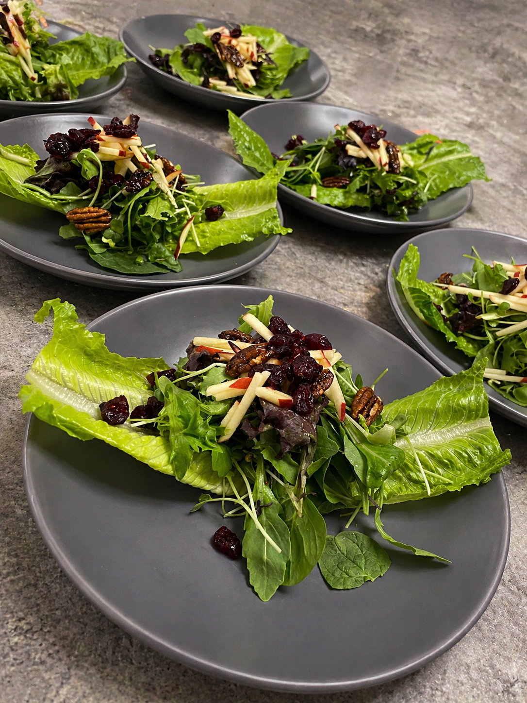 Luna Mesa Catering romaine salad boats with cranberries, apple matchsticks and candied pecans