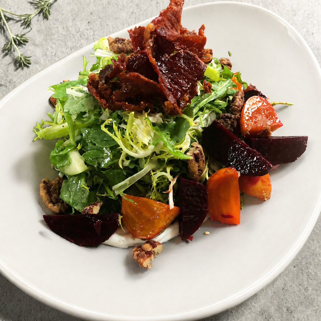 Luna Mesa Catering roasted beet and frisée salad with candied pecans, whipped goat cheese and crispy prosciutto