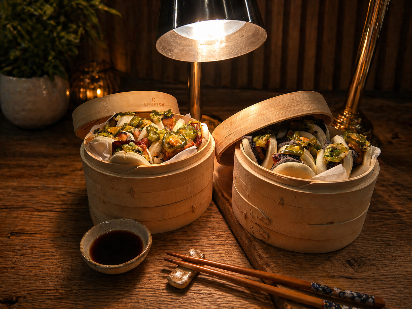 Luna Mesa Catering steamed bao buns in bamboo baskets with dipping sauce and chopsticks
