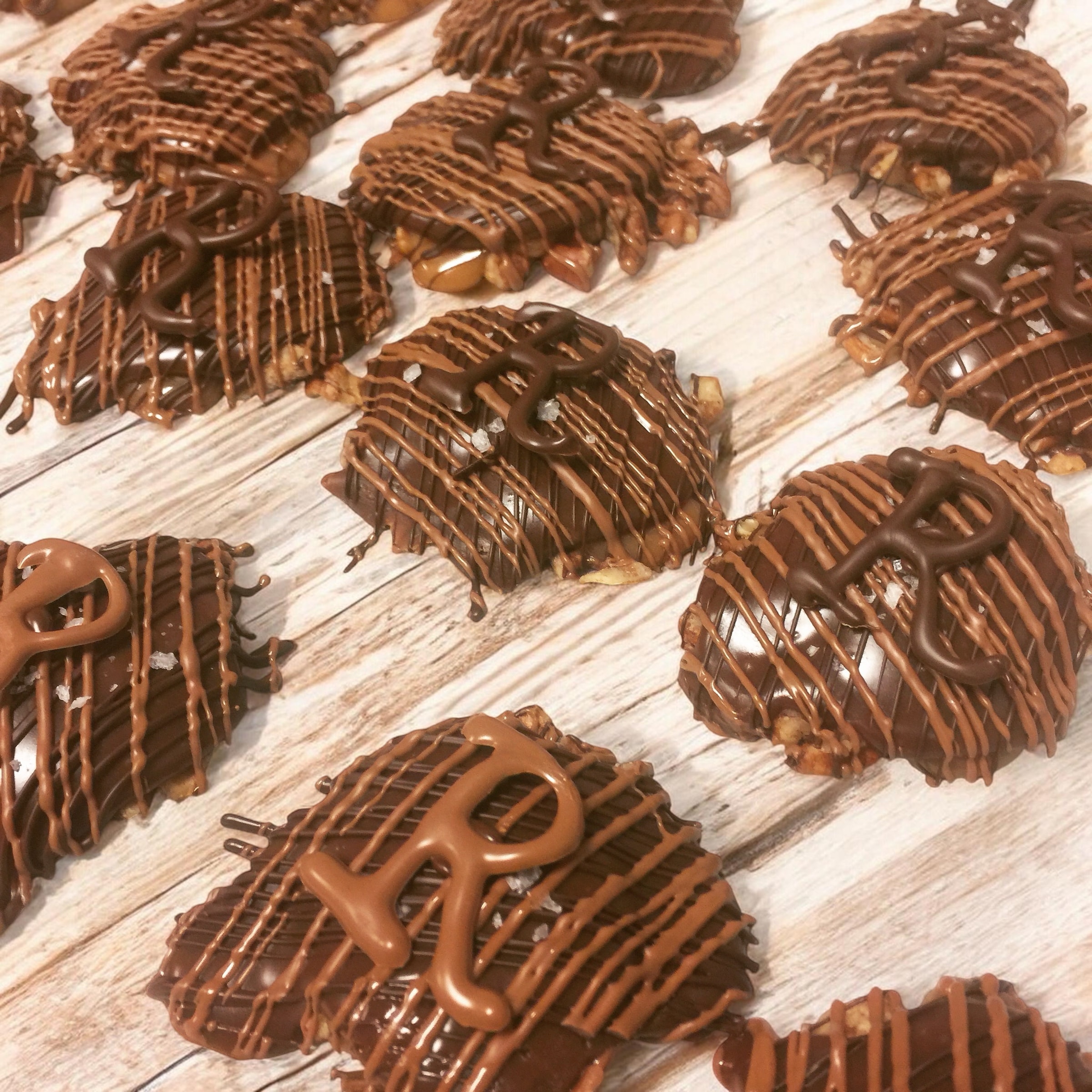Luna Mesa Catering custom chocolate pecan turtles with caramel drizzle and sea salt