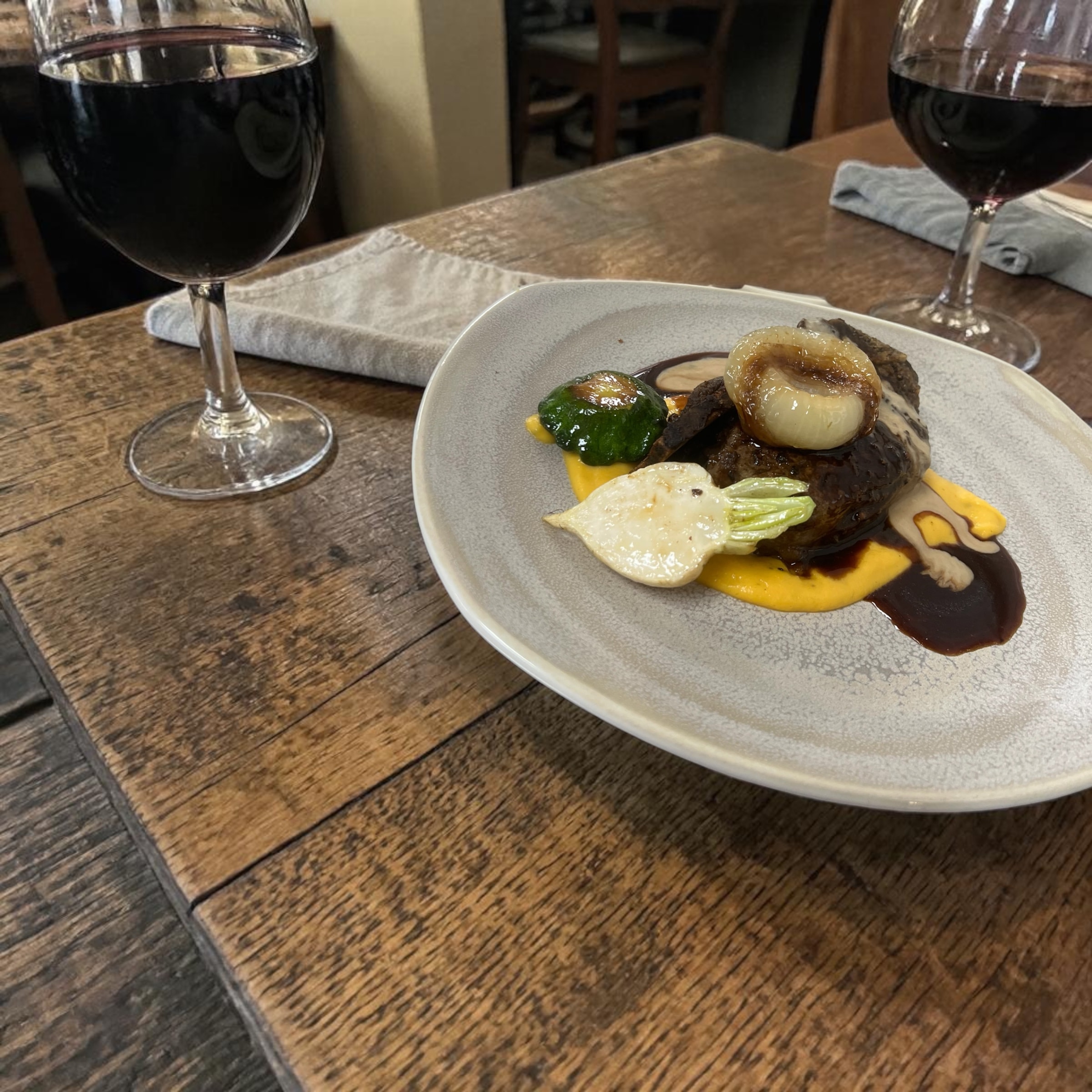 Luna Mesa Catering braised short rib with butternut squash purée, roasted pearl onion, broccolini and red wine reduction